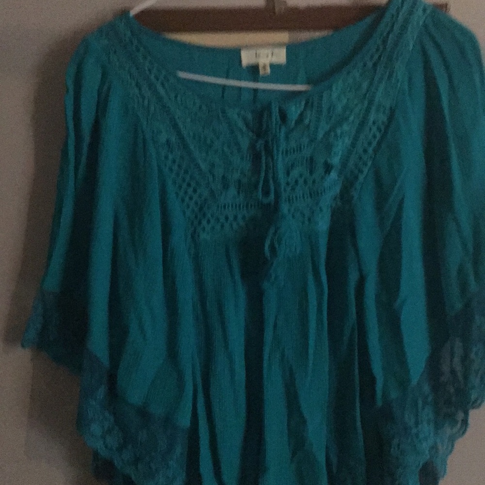 Winged blouse